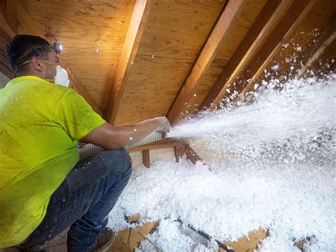 blown insulation around junction boxes in an attic|attic box covering insulation.